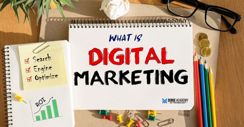 A notebook with the words "What is Digital Marketing" written on it, encircled by coins, colorful pencils, a sticky note with an SEO checklist, and a ROI graph.